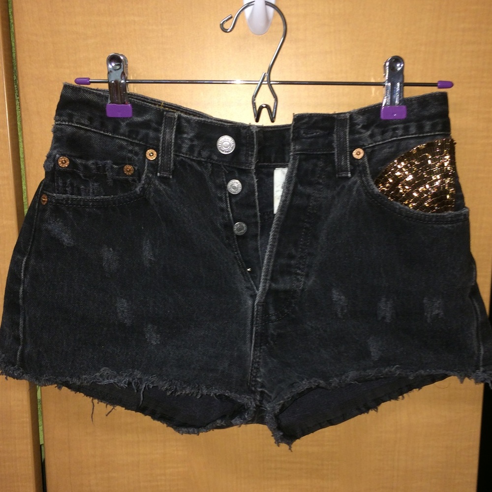 VINTAGE distressed Levi 501 shorts